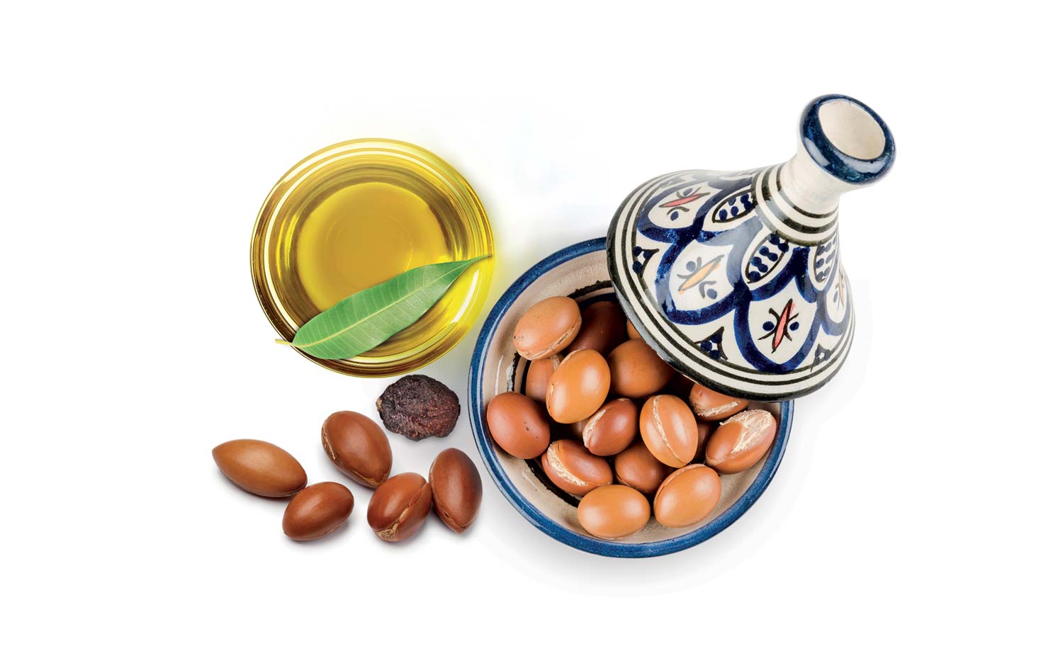 Semi e olio di argan con tajine bianca e blu usati nel packaging design di prodotti cosmetici naturali realizzato da WillBe